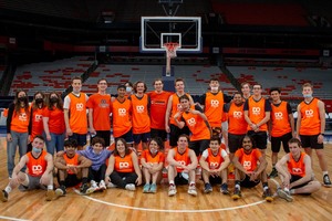 Daily Orange staff members gather for a photo at last month's Media Cup game against WAER at the Dome.
